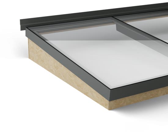 Wall abutment detail of modular roof light with upstand for ease of install