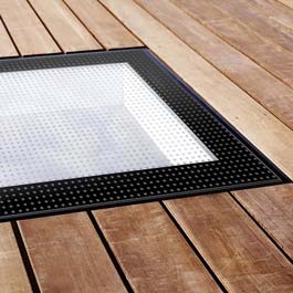 walk on roof light with anti slip fritting. Hardwood decking cut around rooflight