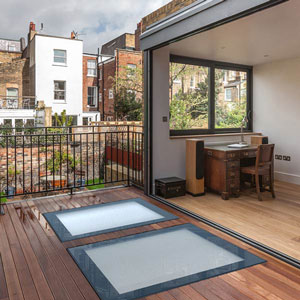 two walk on rooflights in stained hardwood decking on terrace