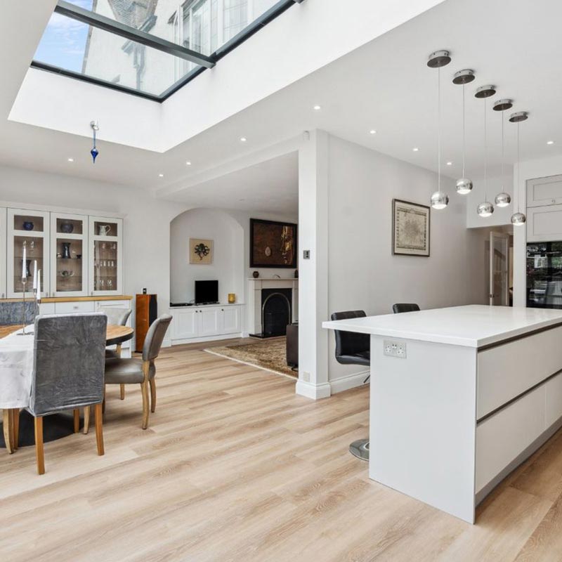 modular rooflight with sleek glazing bar in open plan kitchen