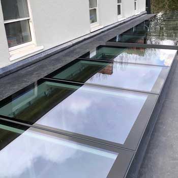 EOS97 modular rooflight with fixed and opening units